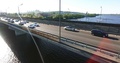 Kyiv Ukraine Patone Bridge Cars Traffic Drone Moving Back Panorama 4k Dnieper.