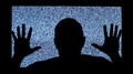 Silhouette Of Man In Television Screen