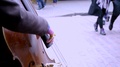 Close Up Of Rainbow Gloved Cello Player Playing
