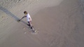 Aerial Metal Detecting Man Beach 1