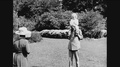 1920 - Henry Ford And Clara Jane Bryant Interact With Their Grandson In A Yard