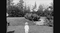 1920 - Henry Ford And Clara Jane Bryant Walk With Their Grandson As He Toddles