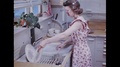 Woman Washing Dishes In A Double Bowl Sink - 1949