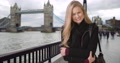 Smiling White British Girl Laughs With Joy Near Tower Bridge In London