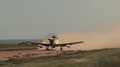 Embraer A-29 Super Tucano Taking Off In Clouds Of Dust In New Mexico