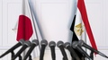 Flags Of Japan And Egypt At International Meeting Or Negotiations Press