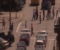 High Angle Shot Of Crosswalk With Pedestrians And Traffic