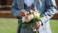 Wedding Bouquet With Beautiful Flowers In The Hands Of The Groom