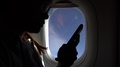 4k, Asian Woman Holding Smartphone Near The Window During Flight Trip Plane-Dan