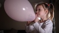 Little Cute Girl Daughter Play At Home With Pink Balloon Releasing It For Fly