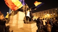 Students Waving Romanian Flag On Statue