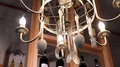 Decorative Chandelier Made Of Plastic Dishes Forks And Spoons. Vintage Style And