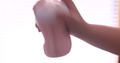 Side View Of A Hand Shaking The Formulated Pink Baby Bottle A Bunch Of Times At