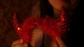 Evil Devil Woman Holding Red Horns Shiny Brocade, Night, Dusk