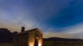 Timelapse Footage Of A Shepherd House Lighted By Two Candles At Night, In The
