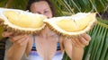 Happy Woman With Durian Fruit At Summer Beach On Vacation
