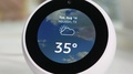 Pond5 Pan shot amazon echo spot being used while washing dishes to show weather for
