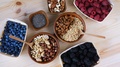 Nuts, Seeds And Berries On The Wooden Table. Superfoods.