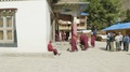 Samagaon, Nepal - March, 2018: Buddhist Monks Go To Service In Monastery.
