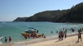 Mexico Huatulco People On Beach With Banana Boat