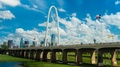 Dallas Skyline Time-Lapse W/Nice Cloud Movement And Landmark Bridge