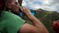 Tired Man Tourist Drinking Water In A Halt.