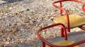 Children's Carousel Spinning On Playground