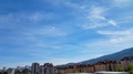 Sky Over The City On A Sunny Day With Some Chem Trails