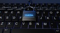 Lock With Chains On Laptop Keyboard Security Concept With Data Text