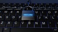 Lock With Chains On Laptop Keyboard Security Concept With Secure Text
