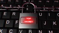 Lock With Chains On Laptop Keyboard Security Concept With Top Secret Text