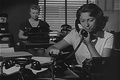 Staff Take Order On Telephone In Radio Station