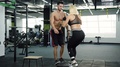 Sport Couple Training In The Gym.