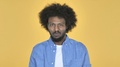 Afro-American Man Shaking Head To Reject On Yellow Background