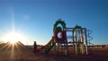 Children On The Playground At Sunset 4k