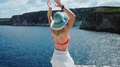 Woman With Sun Hat On Vacation In Greece Relaxing Enjoying Amazing Landscape