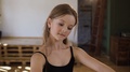Graceful Young Ballerina In Black Body And Skirt Practicing Dance Moves. Ballet