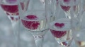Close Up Of Wedding Champagne And Raspberry Cocktails