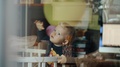 Little Child With Balloon At Home. View Through The Window