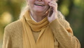 Pond5 Senior woman talking on cell phone, favorable tariffs for elderly, roaming