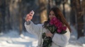 Portrait Of Young Woman Doing Selfie With Flowers