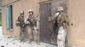 Men Of U.S. Marines Enter A House To Rescue U.S. Citizens During Neo - 2013
