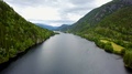 Aerial Fjord Meandering Through Mountains With River