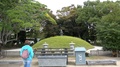 People At The Atomic Bomb Memorial Mound In Hiroshima Peace Memorial Park.