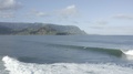 Flat Log Profile Surfer Riding Waves In Hanalei Bay Kauai Hawaii. Drone Aerial
