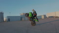 Motorcyclist Training Circle Tricks Outdoor. Slow Motion Shoot. Motorcycle