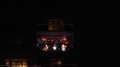 Wide Angle Shot Of Santa Claws And Reindeer Christmas Lights On Apartment Bui