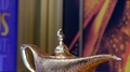 Tilt Shot Of The Magic Lamp Of The Iconic Disney Aladdin On A Pedestal