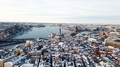 Static Shot Of Stockholm's Old Town And Beyond Covered In Winter Snow