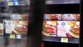 Motion Of Woman Buying Great Value Beef Burgers Inside Walmart Store